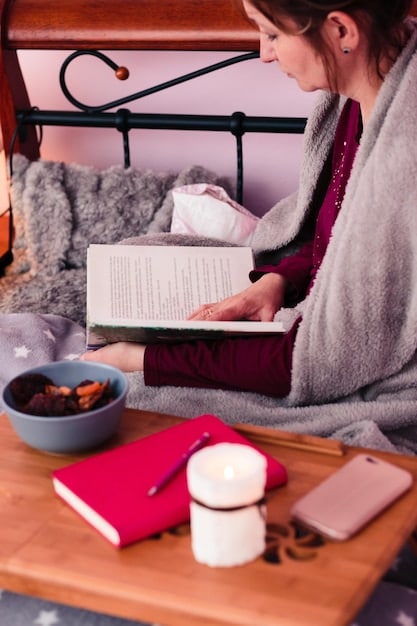 A person peacefully reading a book in a cozy setting, illustrating the benefits of setting boundaries and saying no to unnecessary commitments to gain personal time.