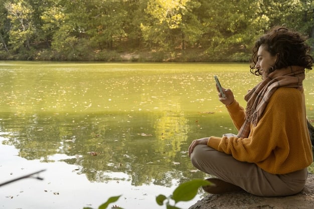 People meditating in a park, guided by audio from their mobile phones. The scene depicts a sense of peace and community.