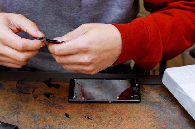 A photo of a technician carefully repairing a smartphone screen in a well-lit repair shop. The technician is wearing a wrist strap to prevent static electricity damage, and various tools and replacement screens are visible in the background.