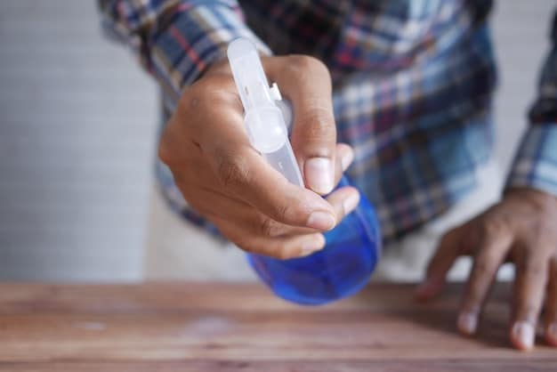 A close-up of a spray bottle dispensing homemade cleaner onto a dirty kitchen counter or surface. The focus is on the cleaning action and the immediate effect (e.g., dirt dissolving or being wiped away). The surrounding environment should be slightly messy to highlight the cleaning power.