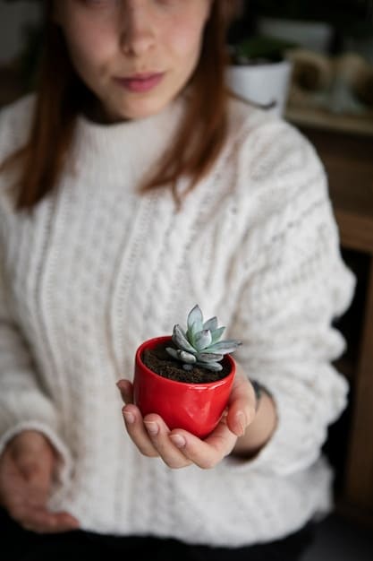 A close-up of hands gently watering a small succulent in a terracotta pot. The focus is on the dry soil and the careful application of water, emphasizing the importance of understanding individual plant needs.